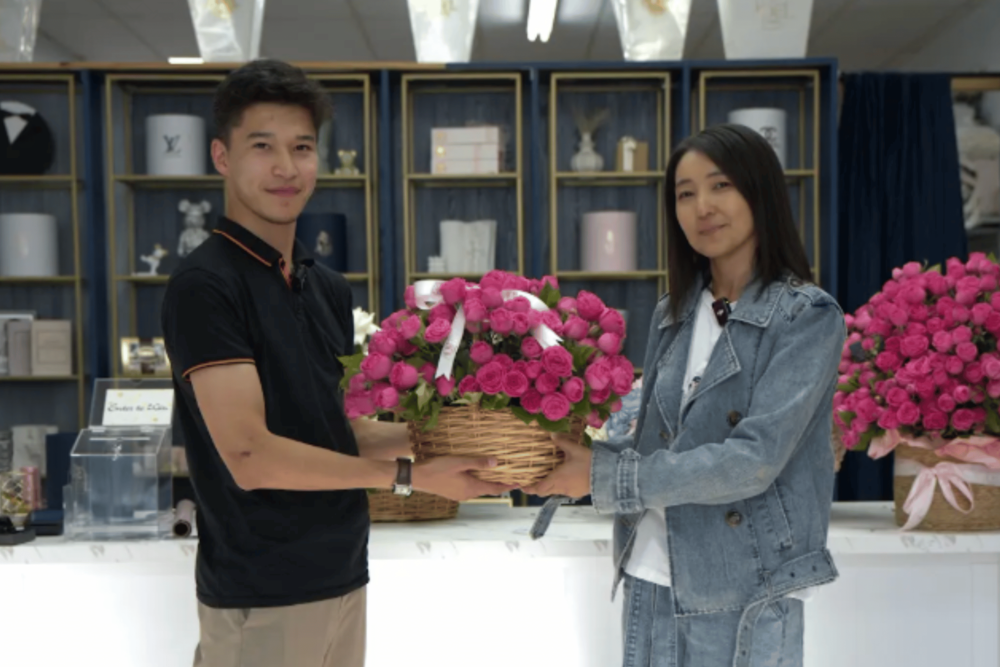 Couple holding flowers